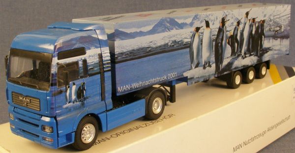 CON66101 - MAN TGA XXL 4x2 met 3 assen aanhanger 2011 WEIHNACHTSMODELL - 1