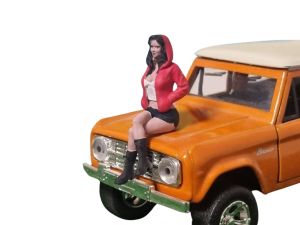 ATLAN32022_ROUGE_BLANC - Zittende vrouw met rode en witte hoodie