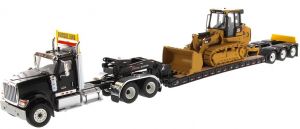 DCM85599 - INTERNATIONAL HX520 6x4 zwart en XL120 machinedrager aanhanger met CATERPILLAR 963K stier inbegrepen