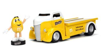 JAD33425 - FORD Coe Flatbed met geel M&M's-figuurtje 1947