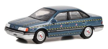GREEN44980-A - 1986 FORD Taurus blauw uit de film TOMMY BOY in blisterverpakking