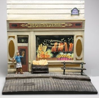AKI0128 - Diorama bakkerijfront met stoep en figuur afmeting H14 cm x B 15 cm x D14 cm