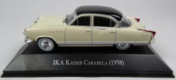 MAGARG48 - IKA Kaiser Carabela 1958 4-deurs saloon wit zwart dak verkocht in blisterverpakking
