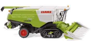WIK038913 - CLAAS Lexion 770TT rooier met maïssnijder op spoor